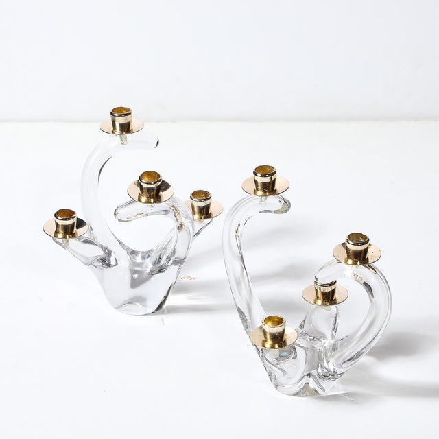 This exquisite pair of mid-century four-arm candelabra, signed Schneider, exudes the timeless grace and refinement...
