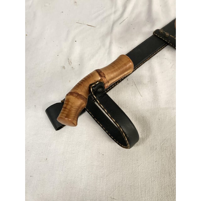 Leather Coat Rack by Jacques Adnet, 1950s, in Very Good conditions. Designed 1950 to 1959 I have official proof of...