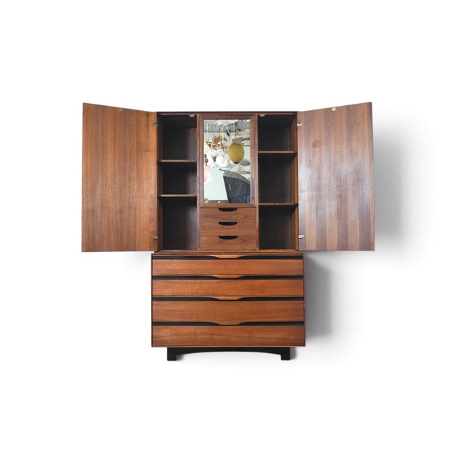 This tall dresser/wardrobe was designed by John Kapel and produced by Glenn of California in the USA during the 1960s....