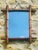 Early 20th century, vintage, French mirror, in a rich, golden brown colored, “faux bamboo'' e, made of beech, with a...