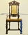 Sense of Change by Aleksey Ivanov | Oil Painting of a chair with a figure and inscriptions For Sale