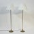 Pair of 1960s Bergboms floor lamp, model G-25. Brass stem on top of a round, almost cone shaped brass base. Mounted with...