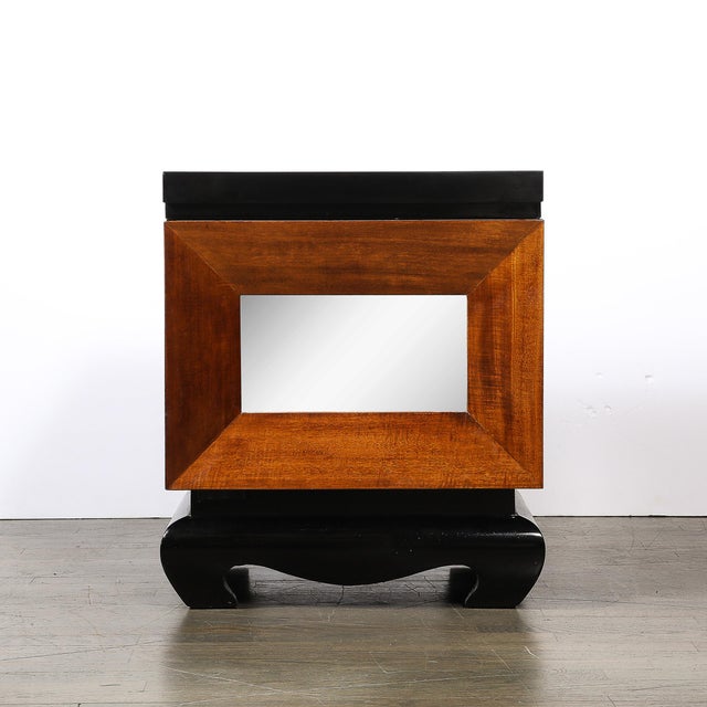 This Mid-Century Modernist shadowbox end table, crafted in America circa 1950 , is a masterful blend of sophistication and...