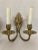 This pair of fine sconces have been electrified and bear the original wax candle sockets. They would suit any neoclassical...