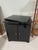 Vintage 1980s black laminate/lacquer swiveling TV media cabinet. The distinctive top panel is designed to rotate, allowing...