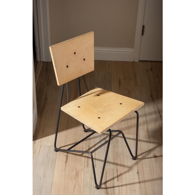 Designed by Steve Sauer and later refined with Bruce Gueswel, this industrial dining chair was created for the early...
