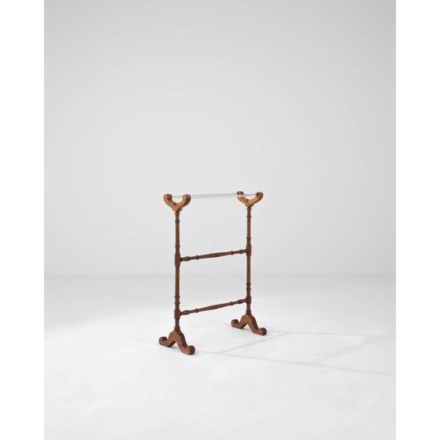 Enhance the sophistication of your living space with this elegant 20th-century French wooden and glass hanger. Crafted...