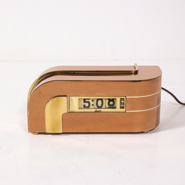 This exceptional Art Deco Lawson Model P-40 streamlined digital electric clock, crafted in America circa 1935, embodies...