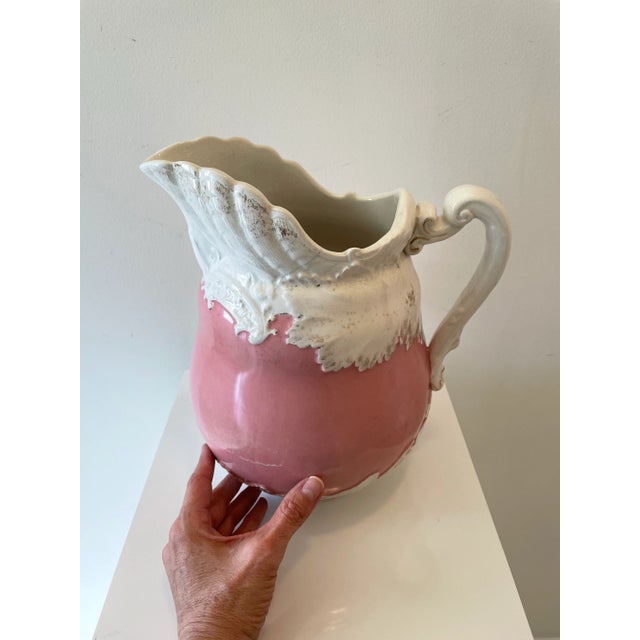 Victorian Pink & White Ceramic Pitcher with Gilded Accents, c. Late 1800s A beautifully aged Victorian-era wash pitcher in...