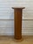 A beautiful vintage wood pedestal with a warm, honey-toned finish and beautifully carved architectural detailing. The...
