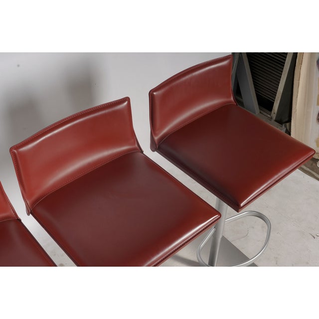 2000 - 2009 Set of Four Frag Bottega Italian Red Leather Adjustable Swivel Bar Stools For Sale - Image 5 of 10