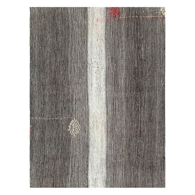 A vintage Turkish flatweave Kilim accent rug handmade during the mid-20th century. Measures: 7' 2" x 10' 7".