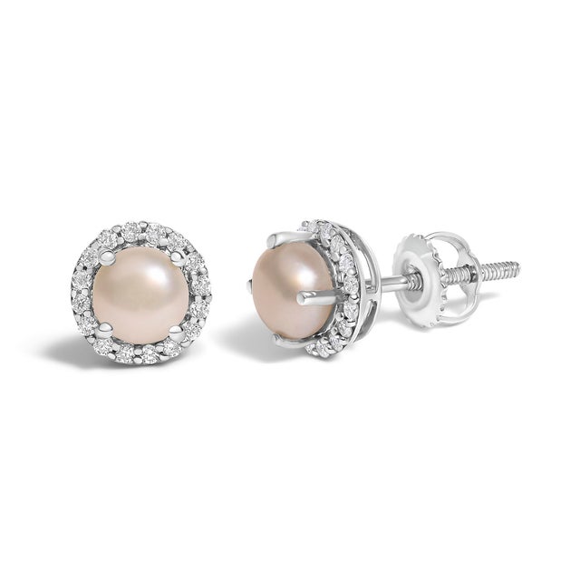 Immerse yourself in the allure of these exquisite 10K white gold stud earrings, each centered with a captivating 5mm...
