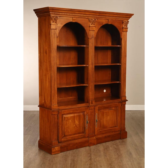 High Quality American Made Carved Maple Double Arched Bookcase with Corinthian Columns and Wooden Shelves Over Cupboard...