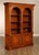 High Quality American Made Carved Maple Double Arched Bookcase with Corinthian Columns and Wooden Shelves Over Cupboard...