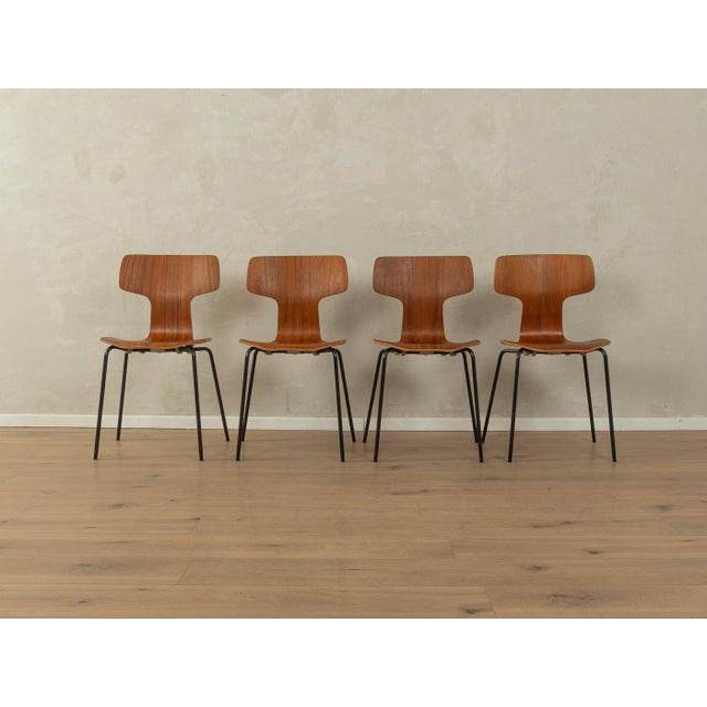 3103 HAMMER CHAIRS from the 1960s by Arne Jacobsen for Fritz Hansen. High-quality stainless steel frame with a teak...