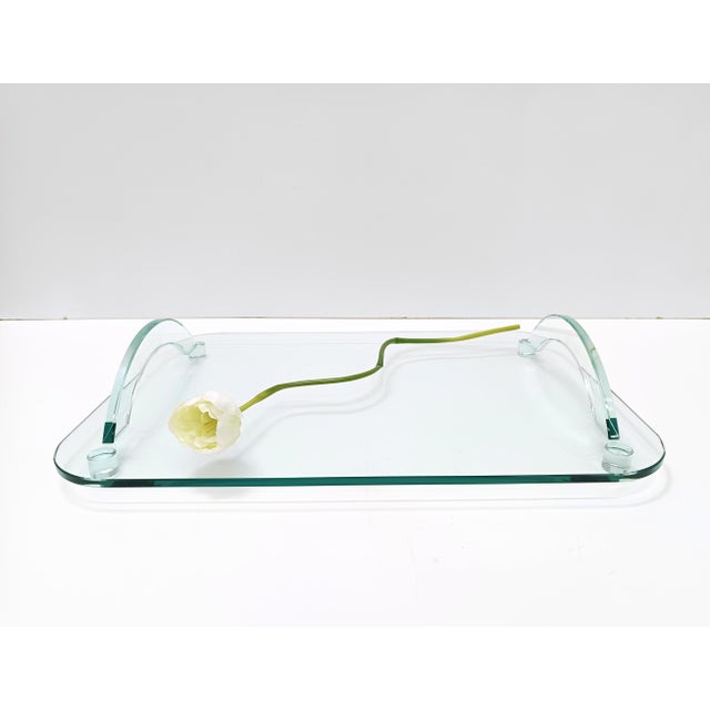 Made in Italy, 1980s. This tray is made in transparent glass. It reminds of Ettore Sottsass' style. This is a vintage...