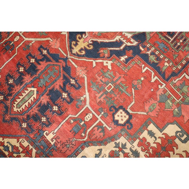 Late 19th century Persian serapi carpet featuring some human elements and pictorial figures. Measures: 11'1'' x 15'1'' The...
