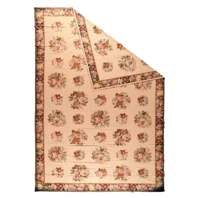 The creamy straw field shows a five by nine array of floating, alternating larger and smaller rose bouquets with secondary...