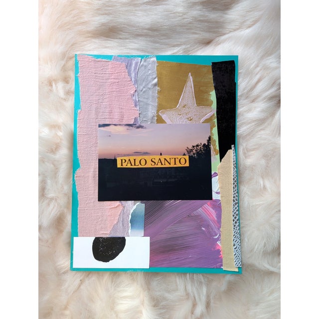 8.5" x 11" An analog mixed media collage featuring the text "PALO SANTO", over a photograph of a city sunset and adorned...