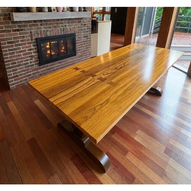 Monumental 10-Foot Arts & Crafts Sculptural Solid Walnut Trestle Dining Table This monumental, collector-grade 10-foot...