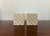 Awesome pair of bookends in travertine by Fratelli Mannelli. Neat cube design, heavy and nicely aged. Small chip on one...