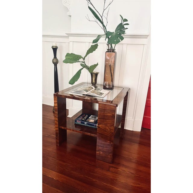 1920s Bauhaus Style Walnut Veneer occasion table. This table is big and handsome and features two tiers for display and a...