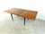 Mid century extendable dining tabled esigned by Belgian Designer Jos De Mey. It has two extra table tops that fold out...