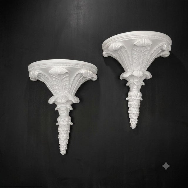 Bring striking architectural dimension to your walls with this spectacular pair of vintage mid-century Hollywood Regency...