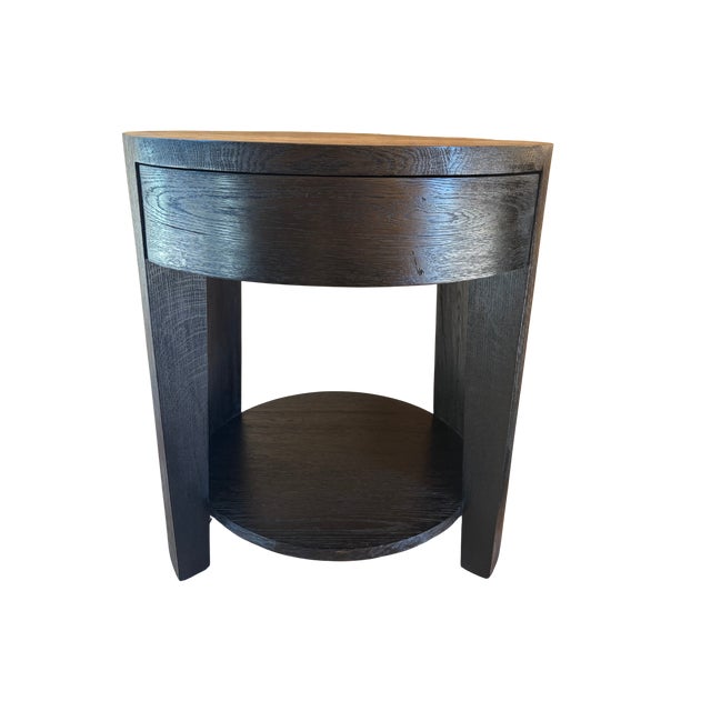 Restoration Hardware Wyeth Oak Round Bedside Tables – Set (Black Oak) Designed by John Birch of WYETH (New York City), the...