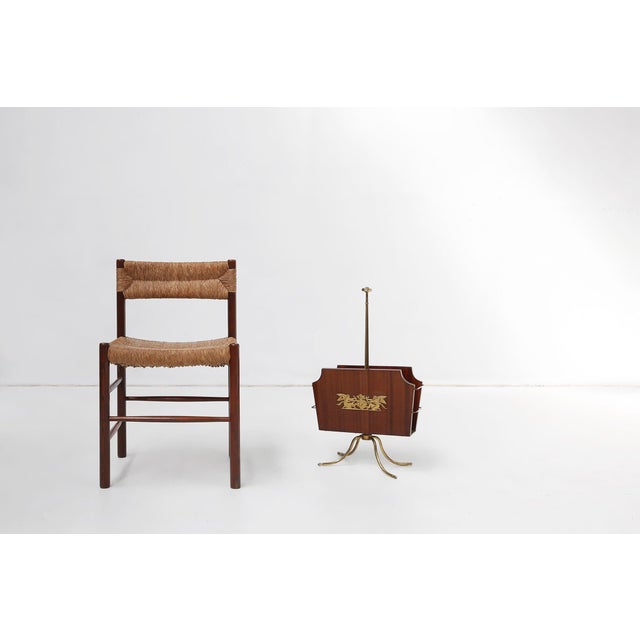 A refined and decorative French magazine rack from the 1950s, crafted in a harmonious combination of warm wood and...