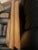 This is a classical, small-scale oil portrait capturing a profile view of a terrier-type dog. Housed in a decorative,...