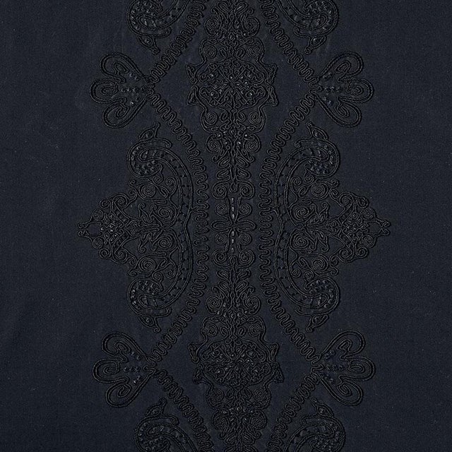 A dramatic tone-on-tone design embroidered with exquisite, hand-guided embellishments, it's part Old World romance and...