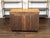 An Austrian Biedermeier commode from the 19th century, with three drawers and block feet. Created in Austria during the...
