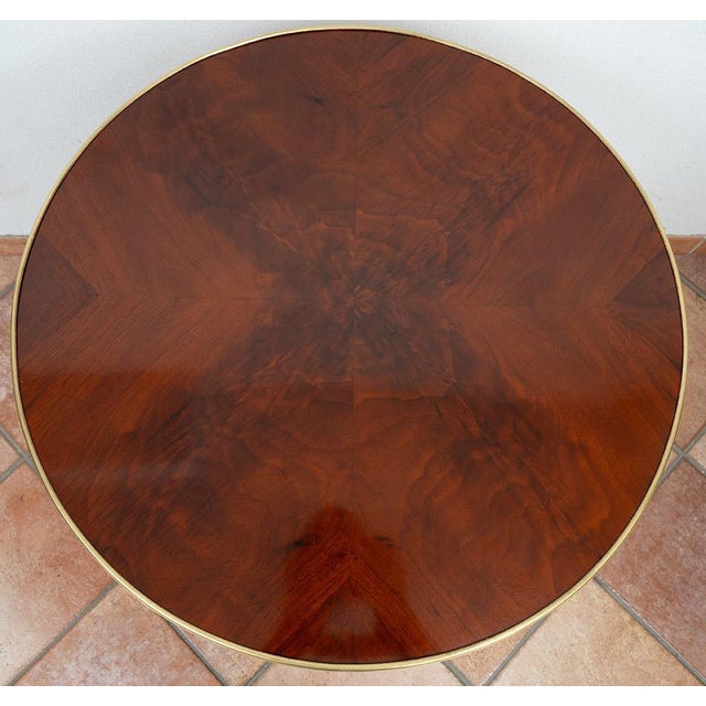 Antique French Napoleon III coffee table in mahogany with gilt bronze inlays. The circular top features a geometric inlay...