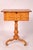 Biedermeier style birch occasional table with a lift top, circa 1950's. The lift top with serpentine shaped front and...