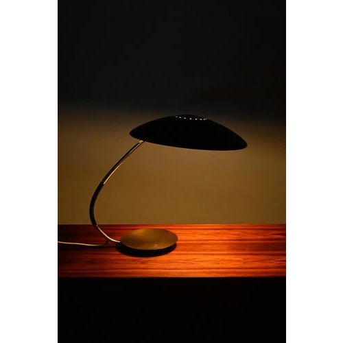 Kaiser idell 6787 desk lamp designed in the mid century modern period with obvious bauhaus influences. The type name is...