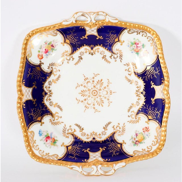 A superb Coalport ‘bat wing’ pattern tea service, circa 1910 in date. The set is superbly painted with flowers between...