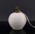 Elegant enameled ceramic ball table lamp. Spherical shape, with white enamel on a light cream background. Art Deco,...