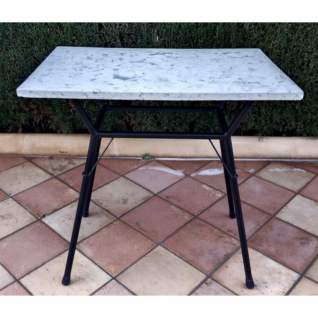 Antique Bistro side table from circa 1930, made of marble and iron, handcrafted. This Art Nouveau style...