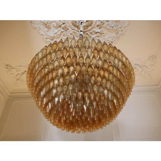 Monumental XXL chandelier made of Murano glass, executed in the distinctive Venini style. This imposing fixture is...