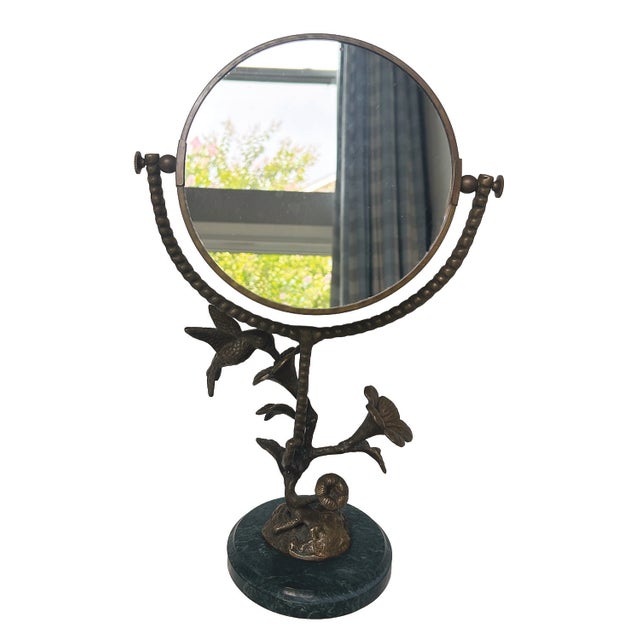 Add a touch of whimsy to your vanity with this charming hummingbird and flower stem vanity mirror. This enchanting vanity...