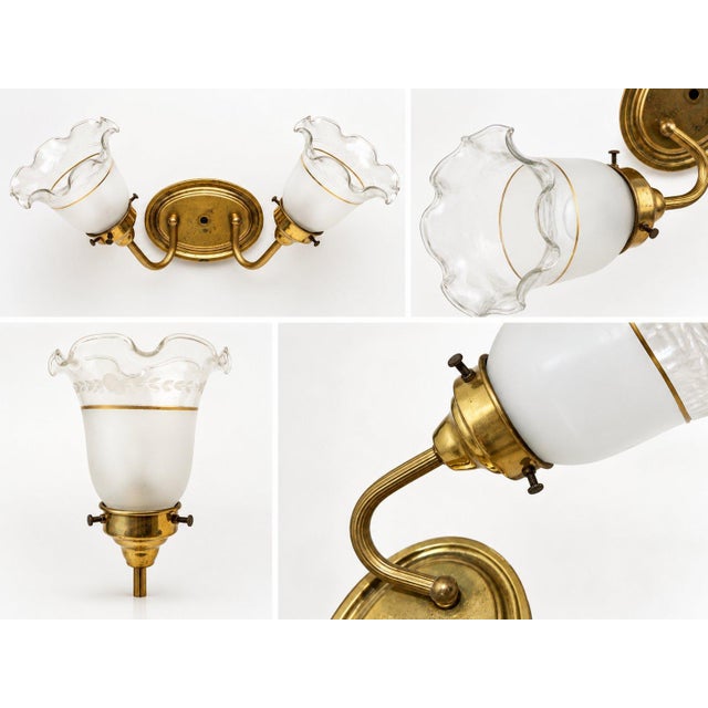 Vintage French-inspired wall sconce with elegant Art Deco and Neoclassical influences. This double wall light would look...