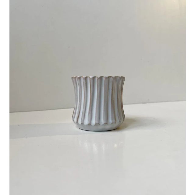 Delicate white glazed and Fluted pottery vase or small planter designed by Christian Jensen and manufactured at his work-...