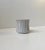 Delicate white glazed and Fluted pottery vase or small planter designed by Christian Jensen and manufactured at his work-...