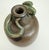 Fantastic early 20th century studio pottery vase jug featuring a green snake coiled around the neck. In the style of folk...