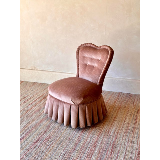 Nothing steals a lady’s heart quite like a pink vanity chair! The back has this soft, heart-shaped curve that gives it...