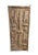 This vintage Dogon granary door from Mali showcases exceptional carved relief artistry, featuring four standing chiwaras...