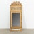 Lovely narrow gold gilt trumeau mirror with carved ribbon design crowning the upper top, carved trim, beaded detail and...