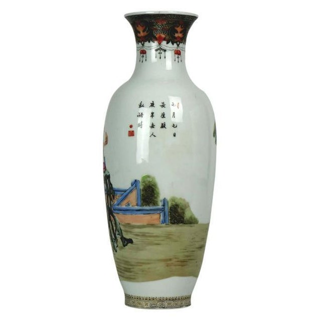 This elegant antique Chinese porcelain vase features a tall, refined shape with intricate calligraphy or poetry on one...